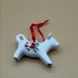 The Pioneer Woman White Ceramic Cow Ornament with Red Floral Design